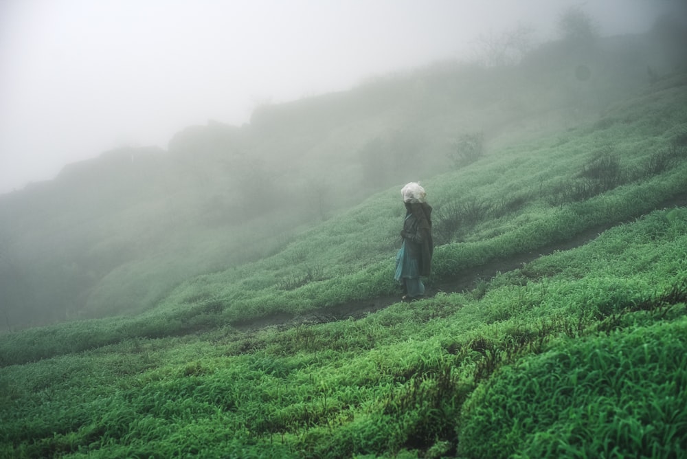 woman on green field