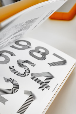 a close up of a book with numbers on it