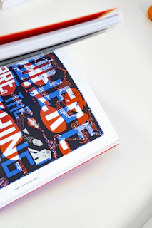 a book sitting on top of a white table
