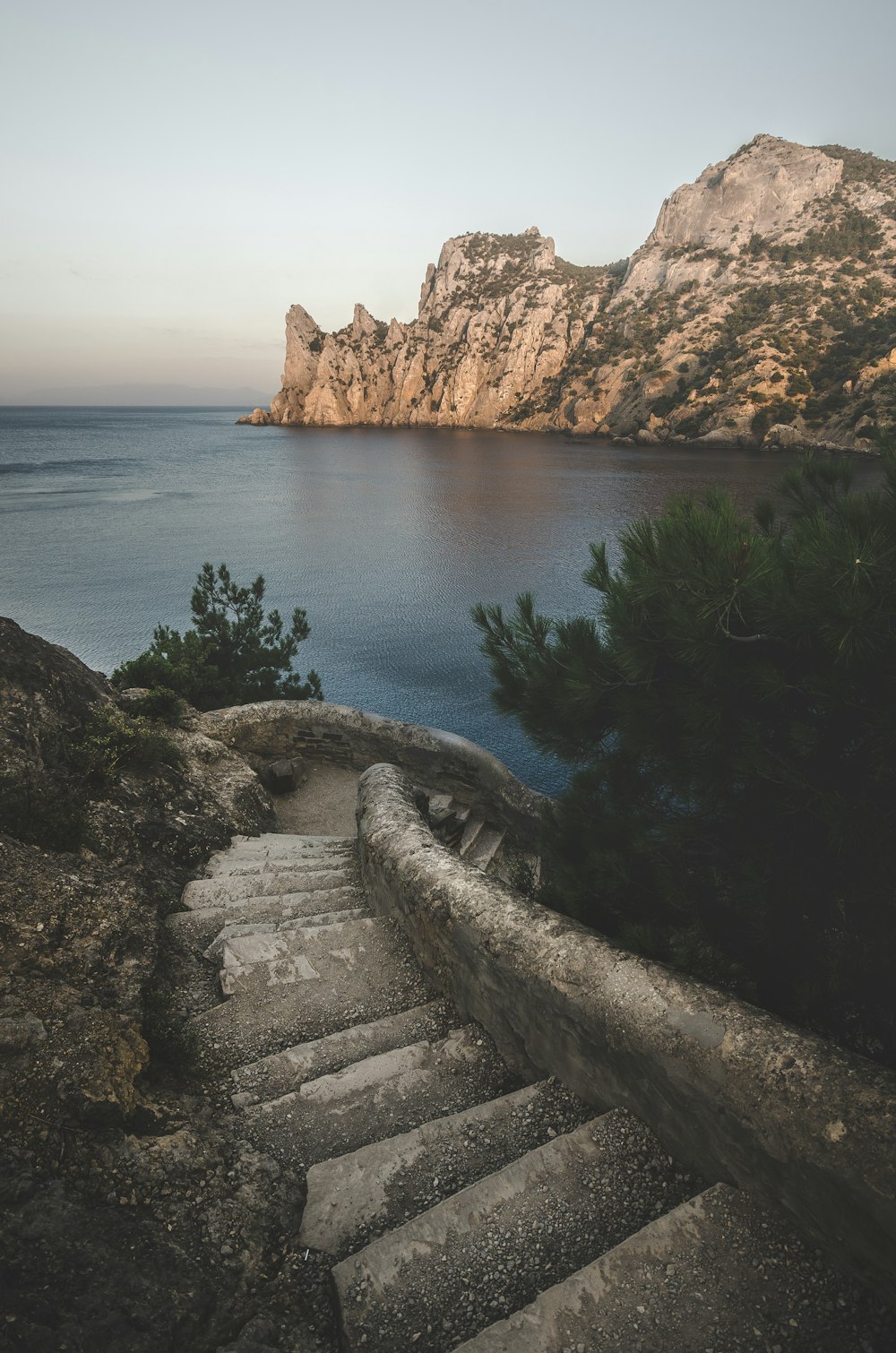 a set of stairs leading up to the water