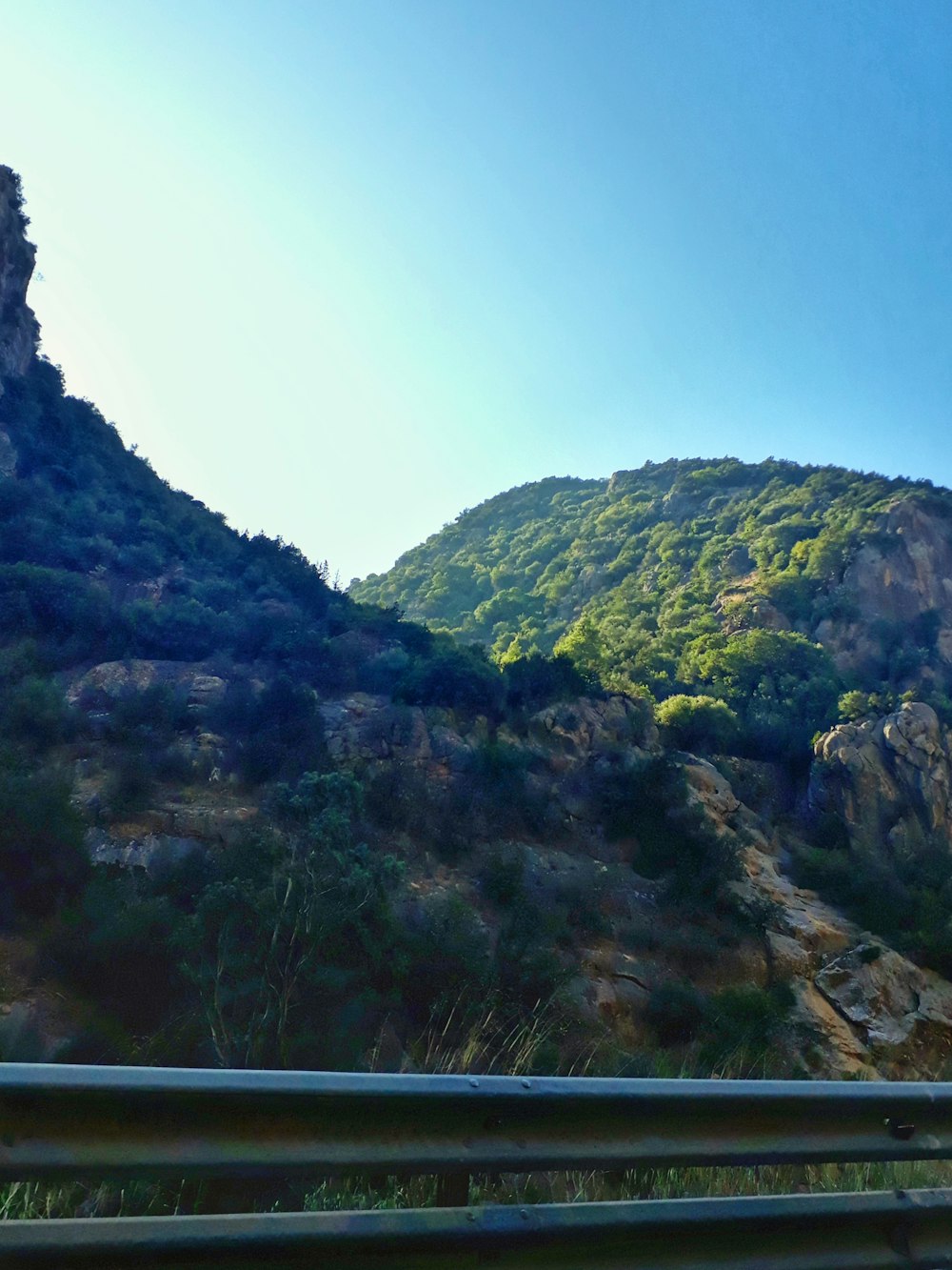 a view of a mountain from a highway