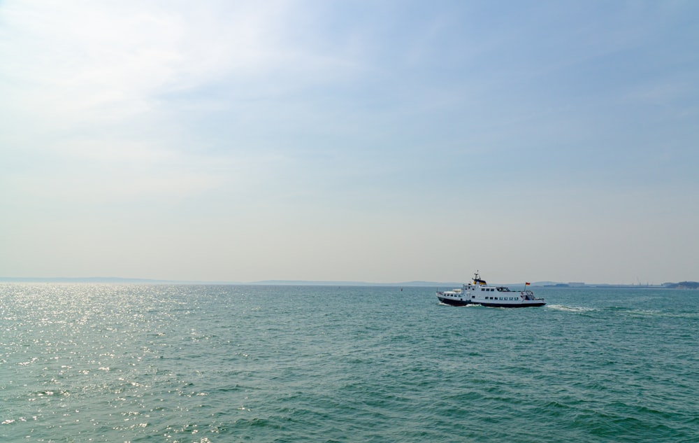 white ship on water