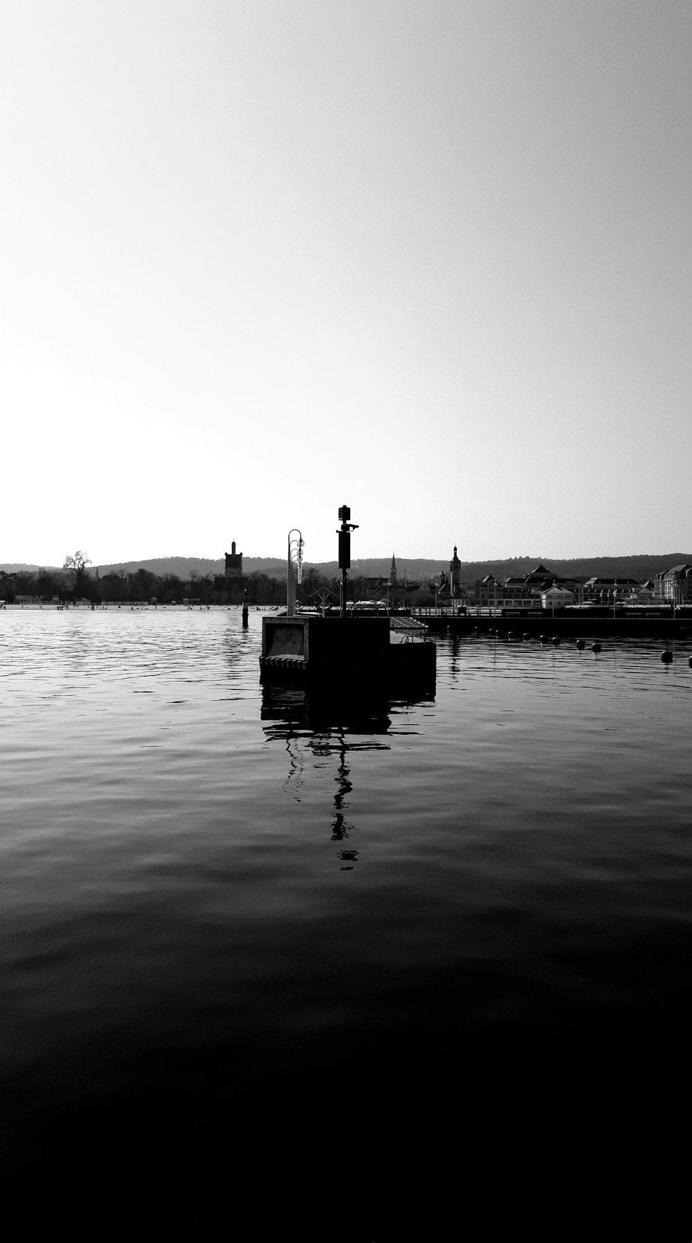 a black and white photo of a body of water