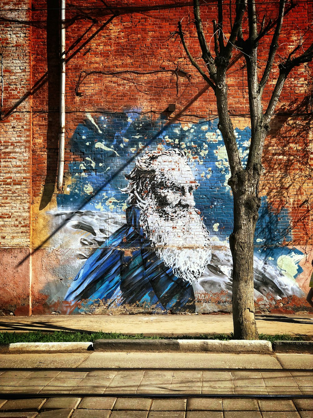 man with mustache wall painting