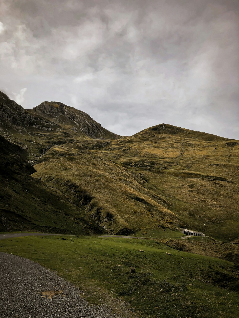 black and green mountains under white sky at daytime