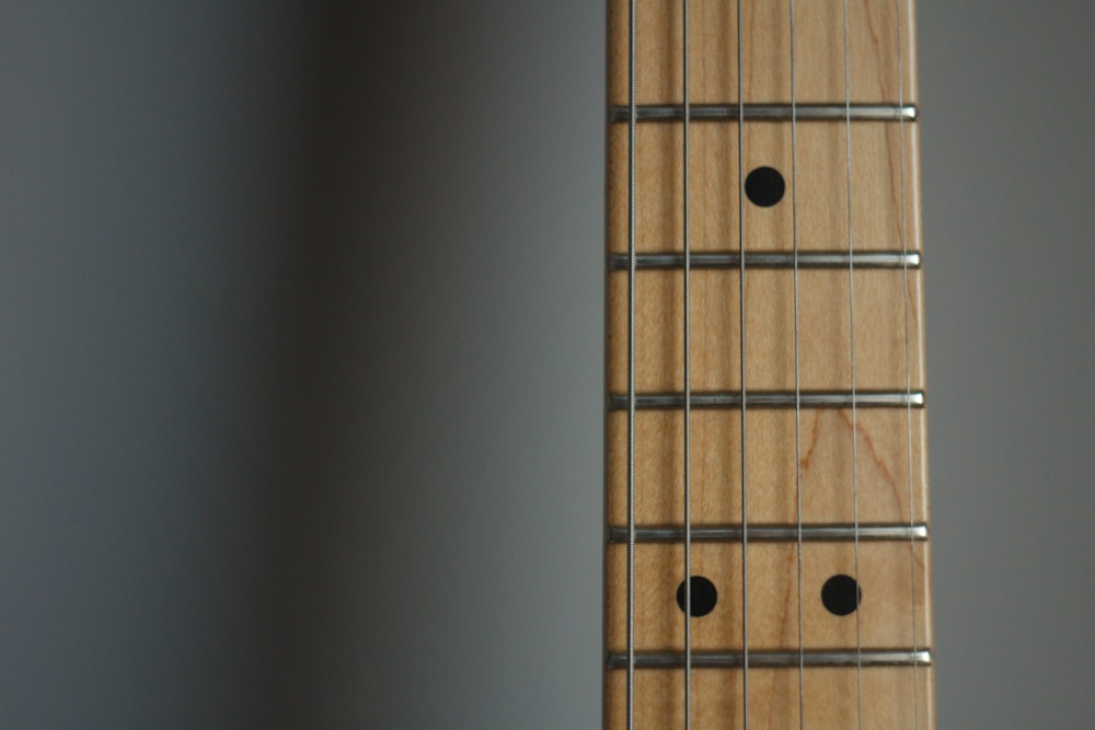 brown and black guitar