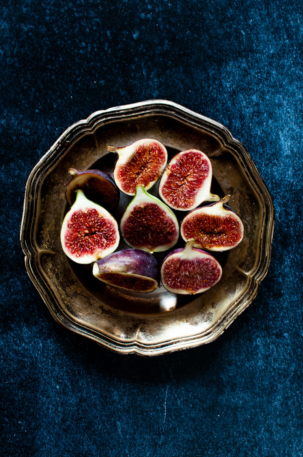 red fruits in brown plate