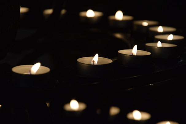 Softly lit candles arranged in a circle, creating a warm and inviting atmosphere for special events.