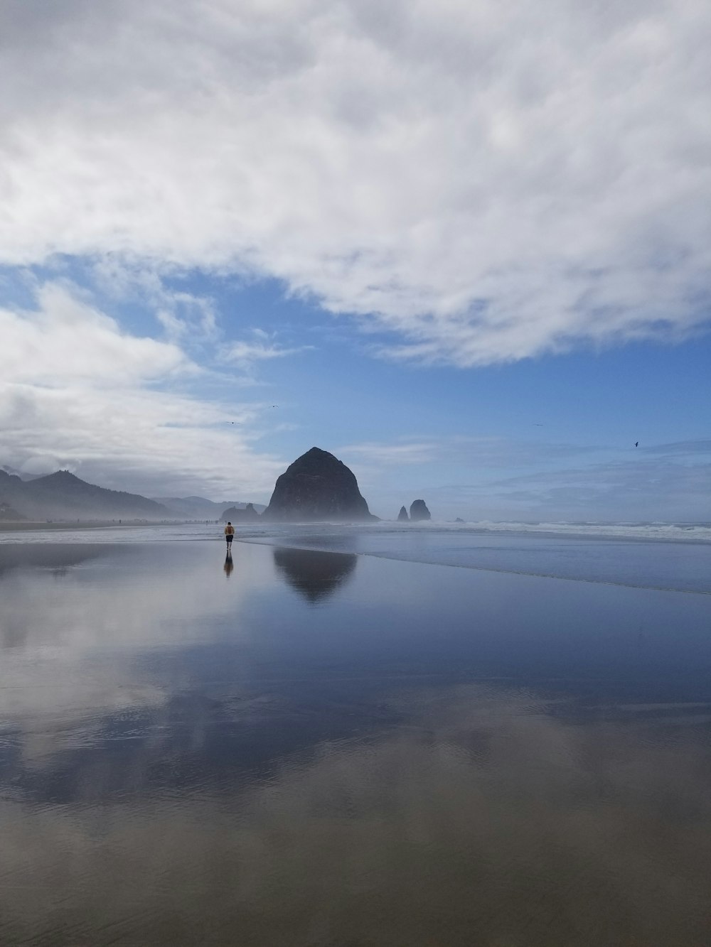 person standing on body of water