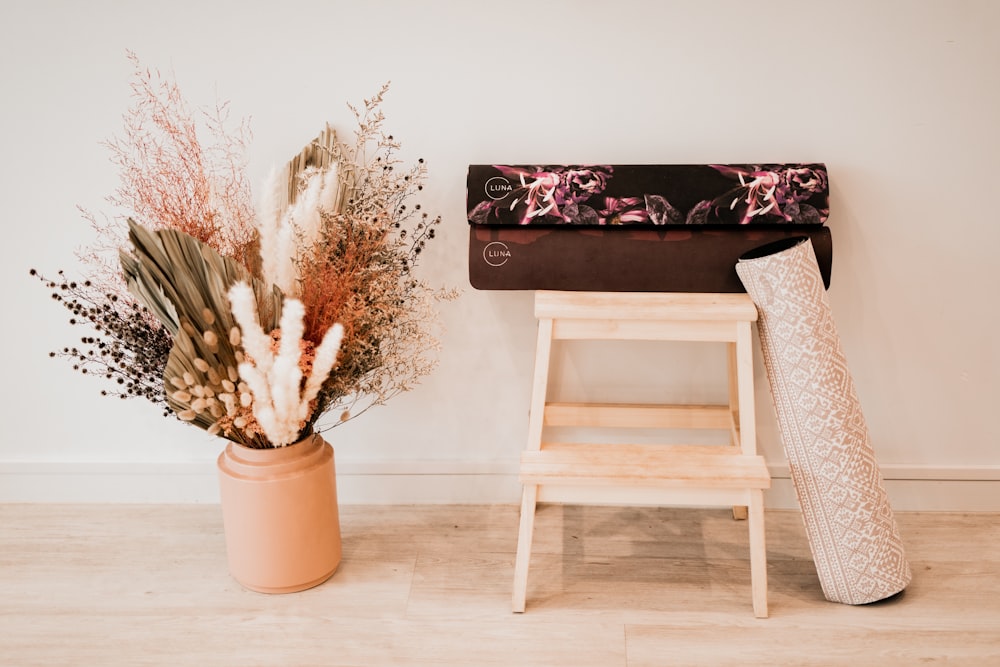 plants and flowers in pot on floor