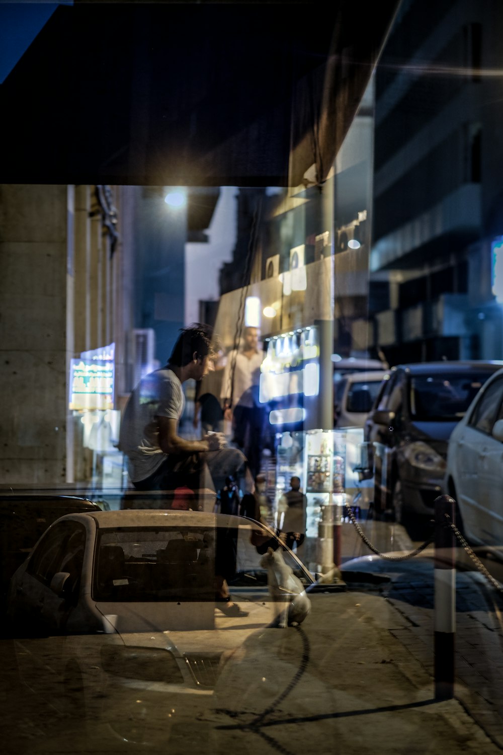 unknown person sitting indoors