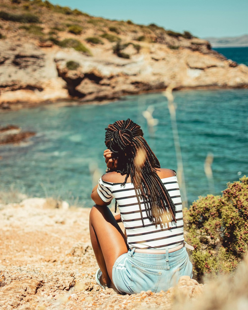 woman sitting on ground