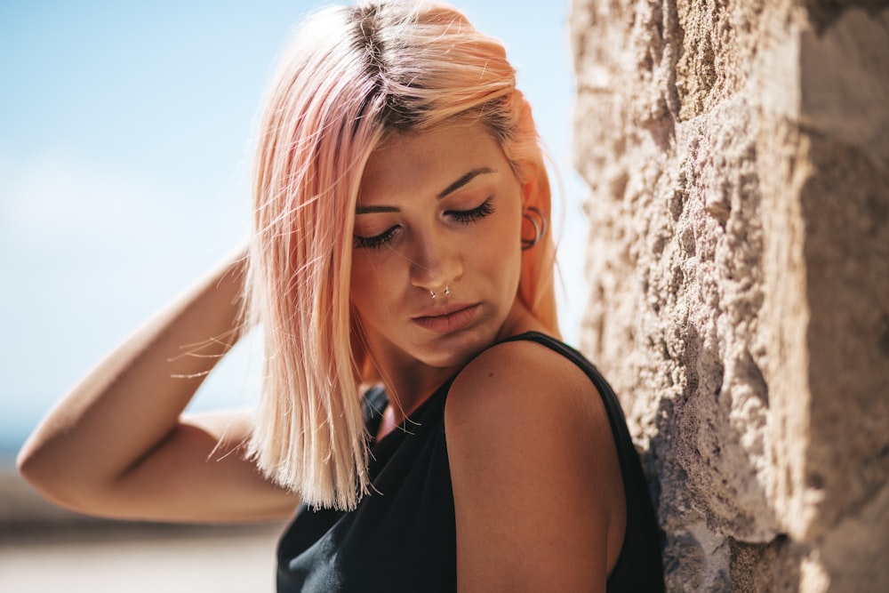 woman holding her hair