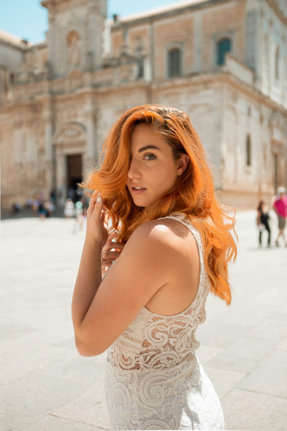 woman in white lace top