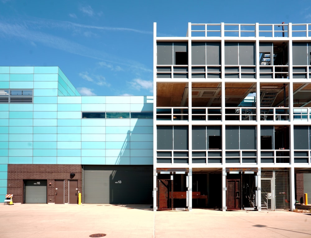 white and blue concrete building at daytime