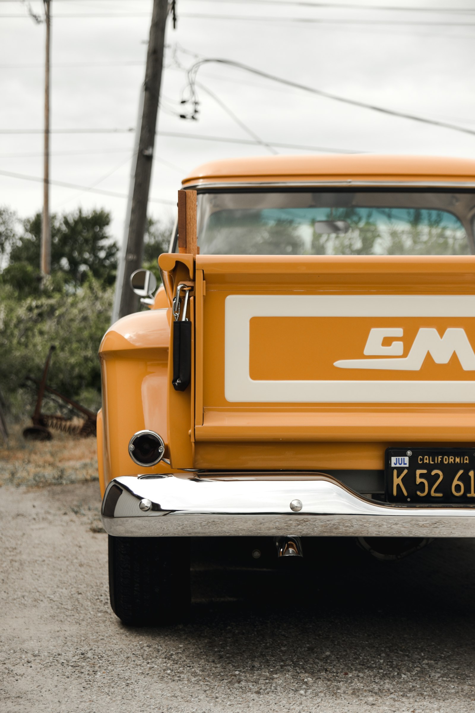 Nikon D5600 + Sigma 17-50mm F2.8 EX DC OS HSM sample photo. Parked yellow car photography