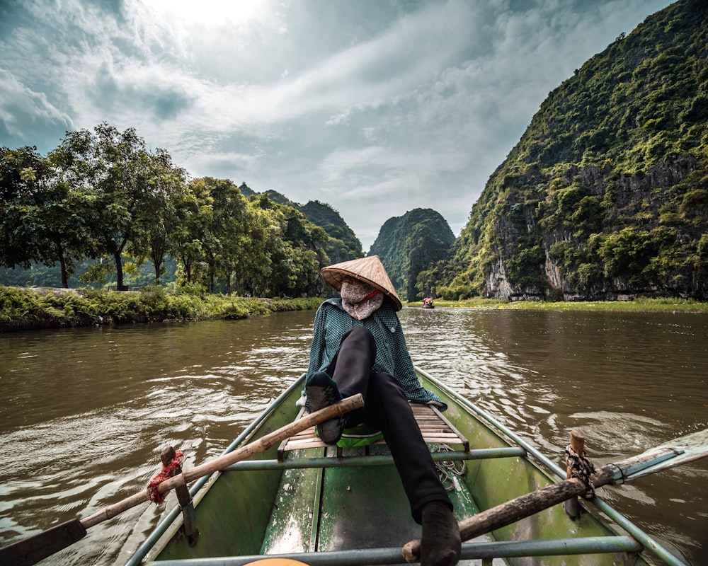 man riding on boat