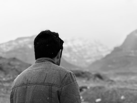 greyscale photo of man in Fars Province Iran