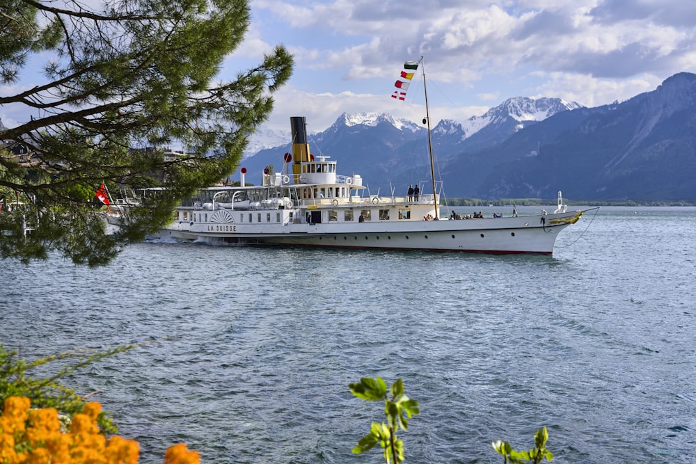 white ship under cloudy sky