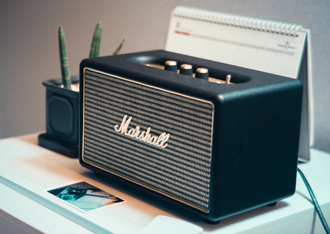 black Marshall speaker on table