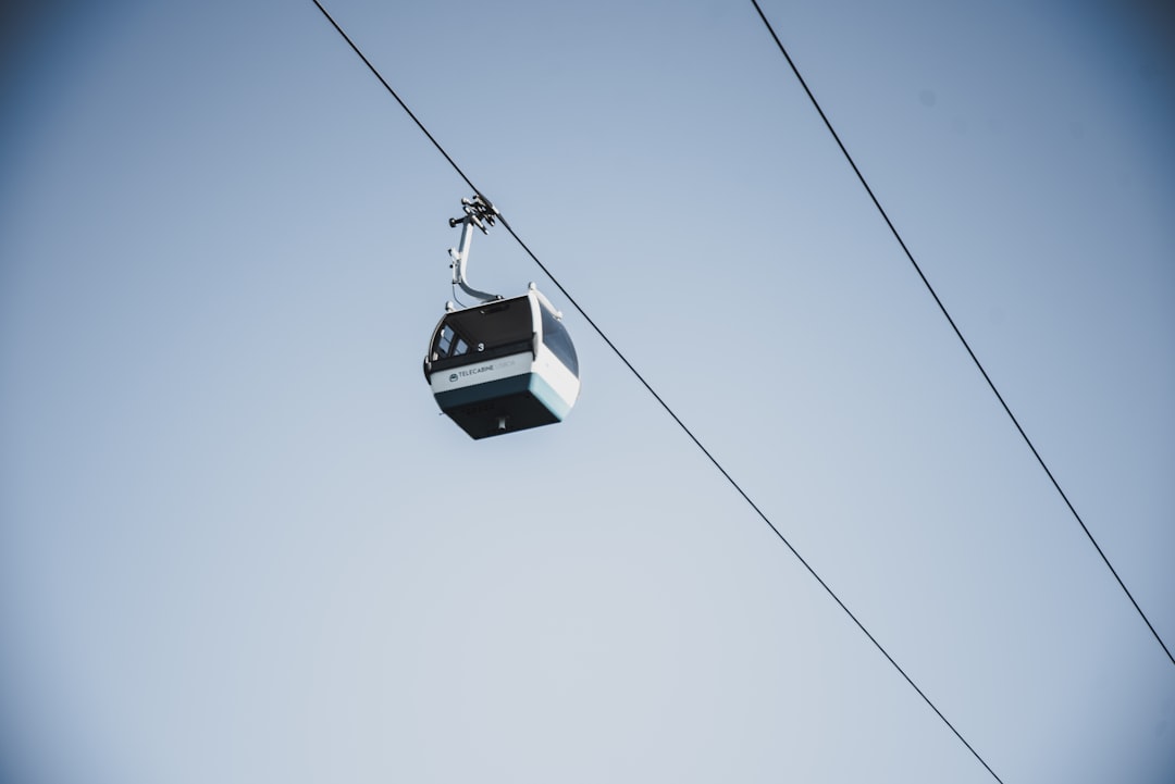 white and black cable car during daytime