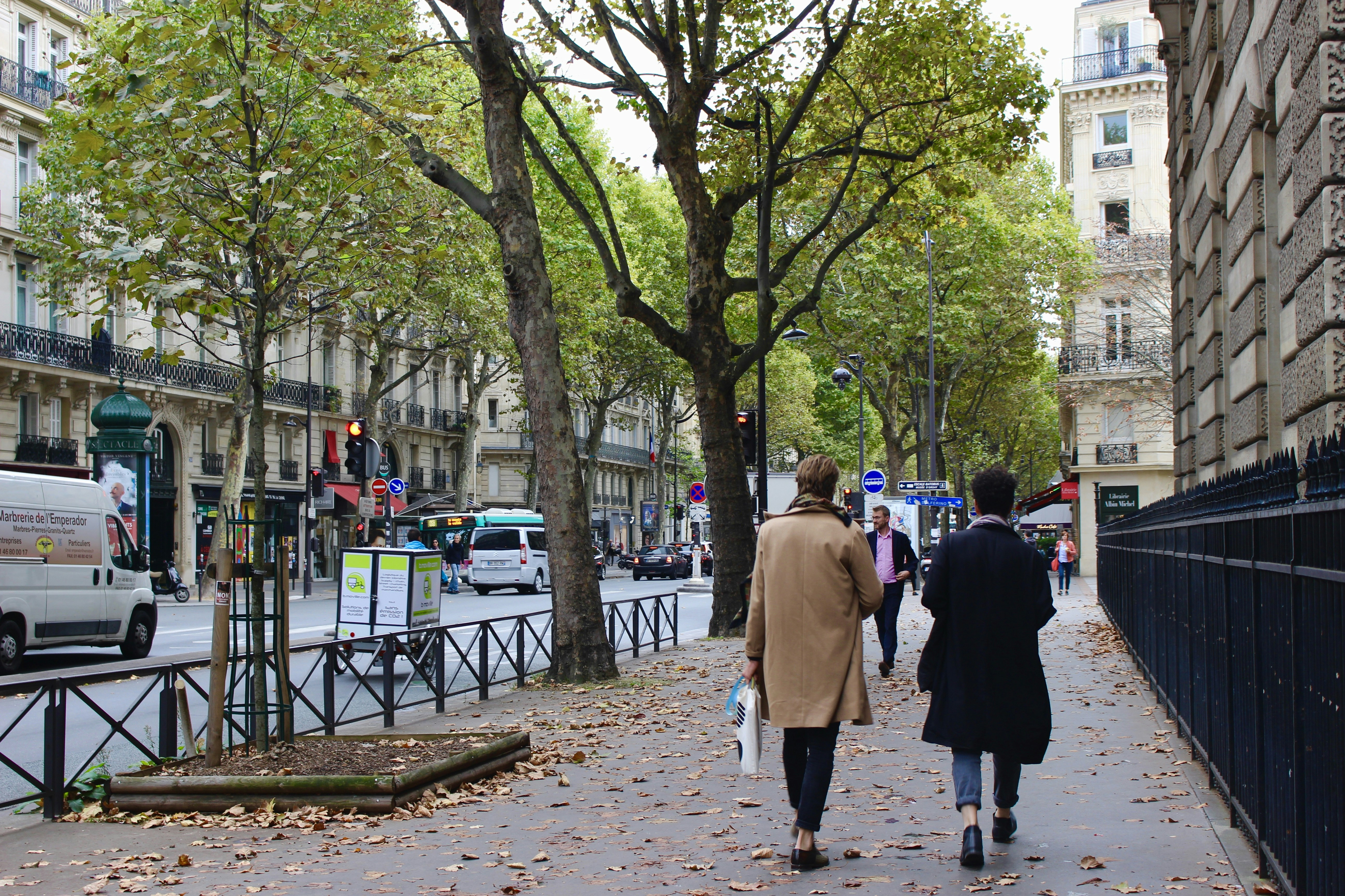 people walking on sidewalk, 