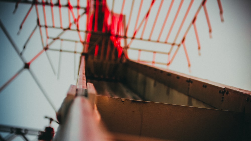 a close up of a red object on a building