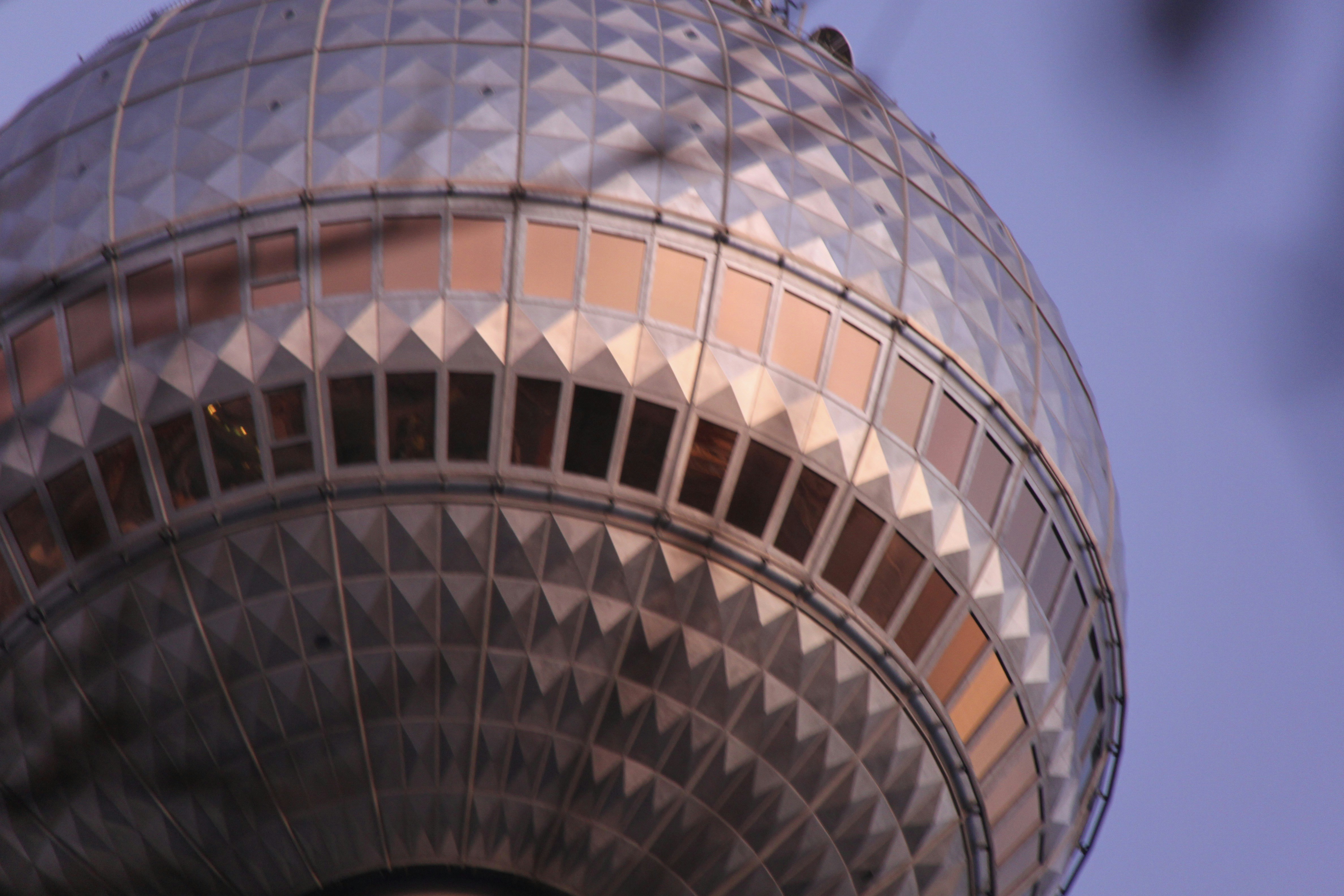 round structure under blue sky