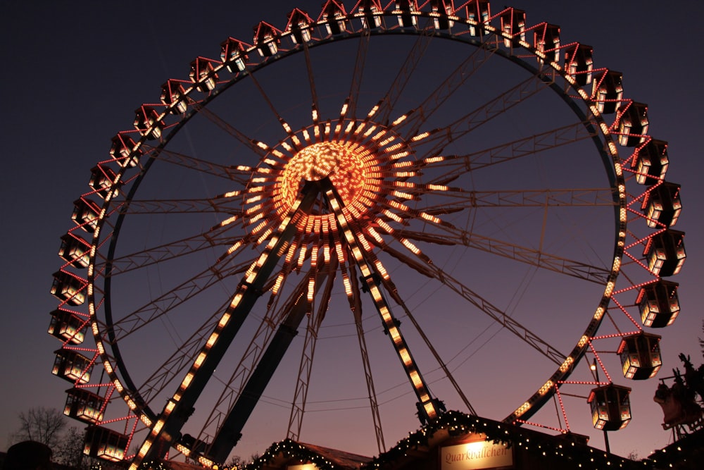 lighted Ferris wheel at night