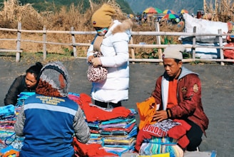 people sitting near apparel lot