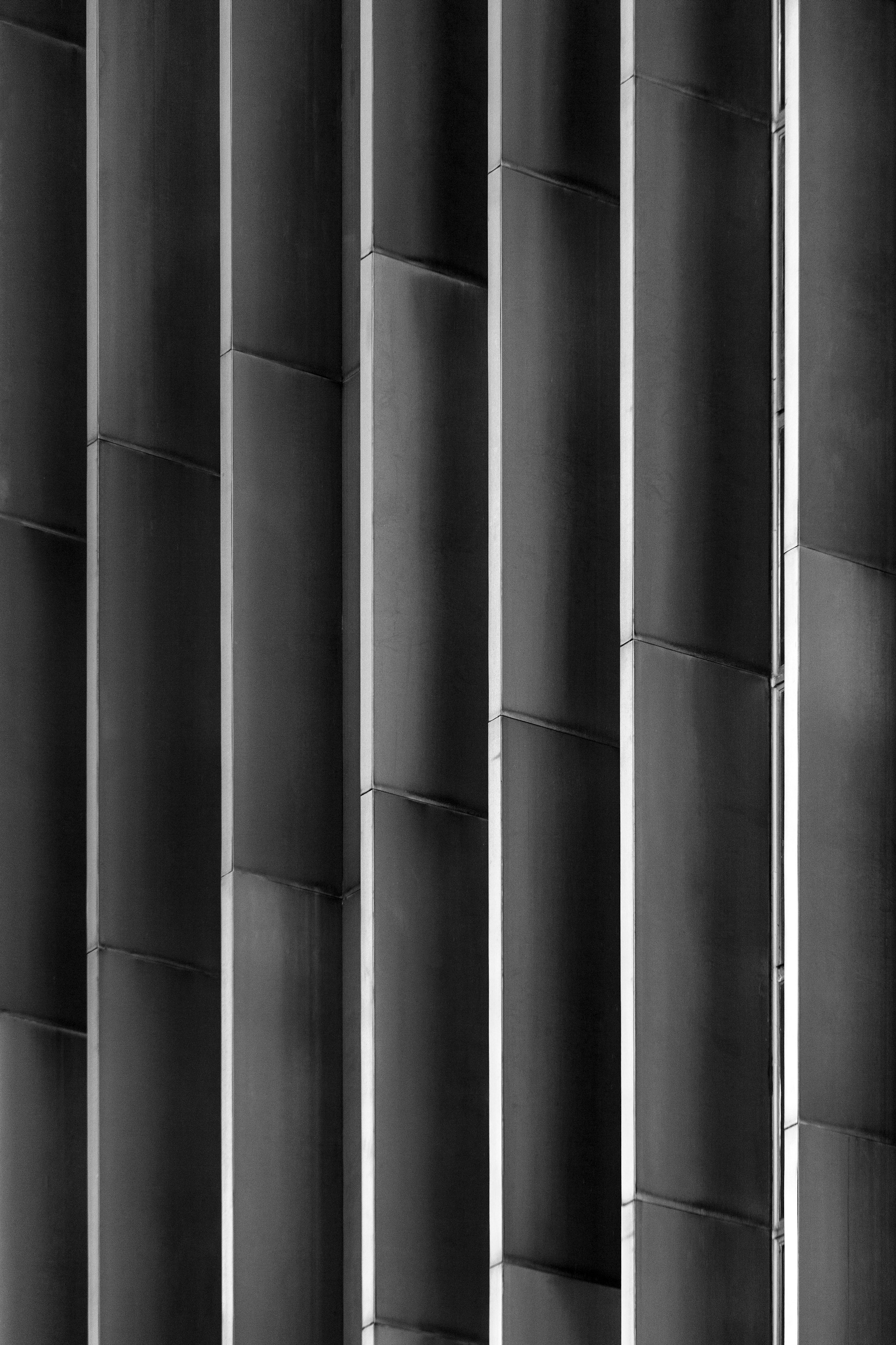 a black and white photo of a tall building