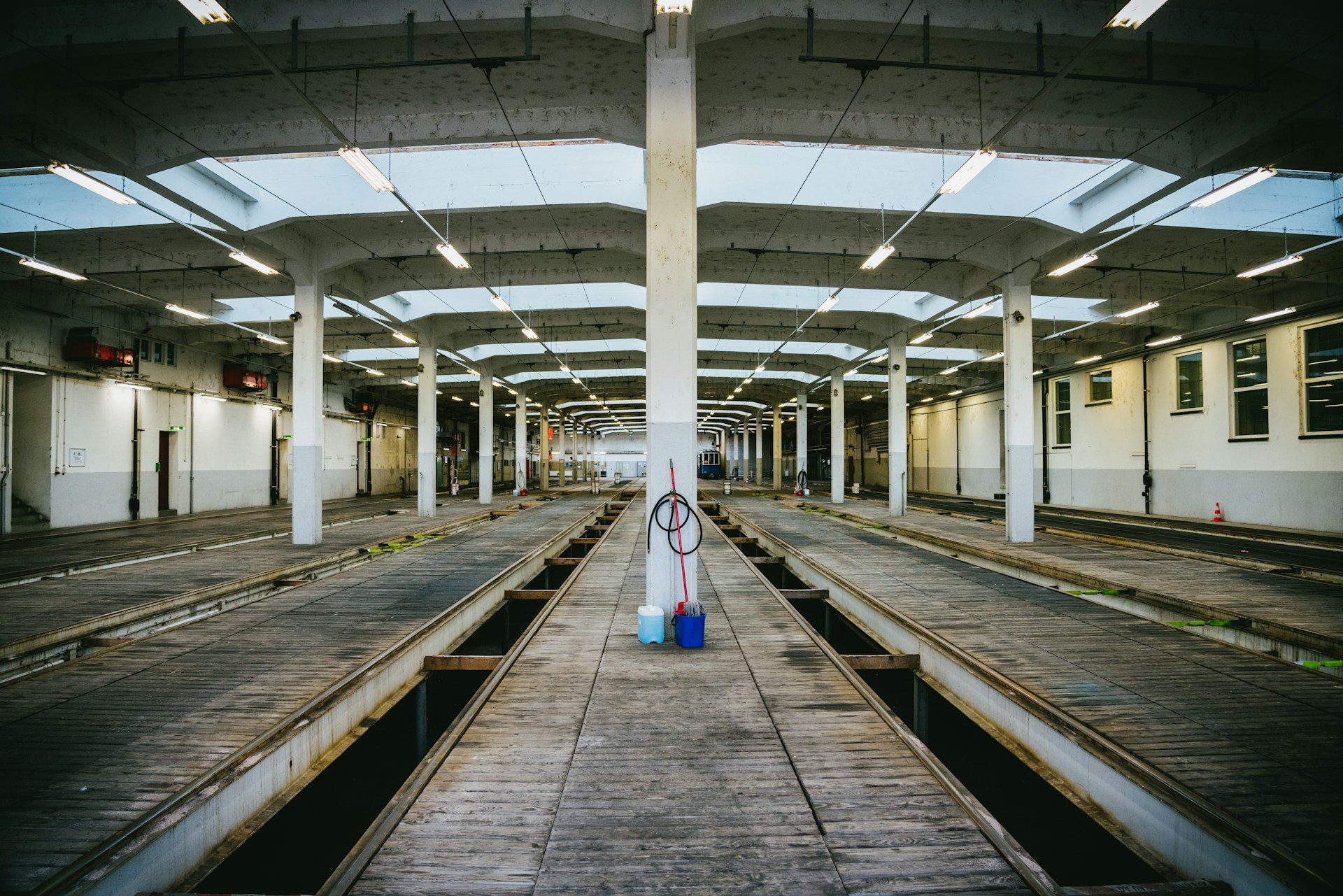 a train station with a train on the tracks