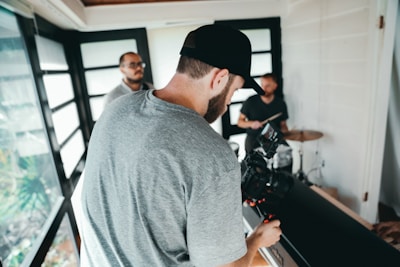 Close-up of a content creator filming a lifestyle video with natural lighting.