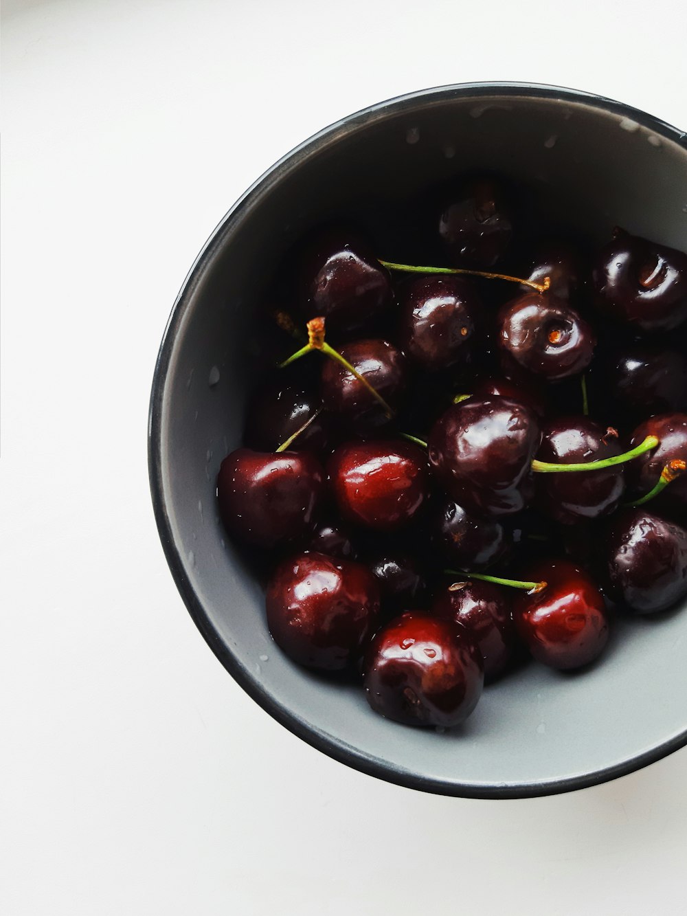 red cherries in bowl