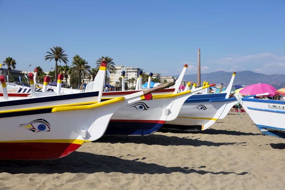 lined boats on seashore