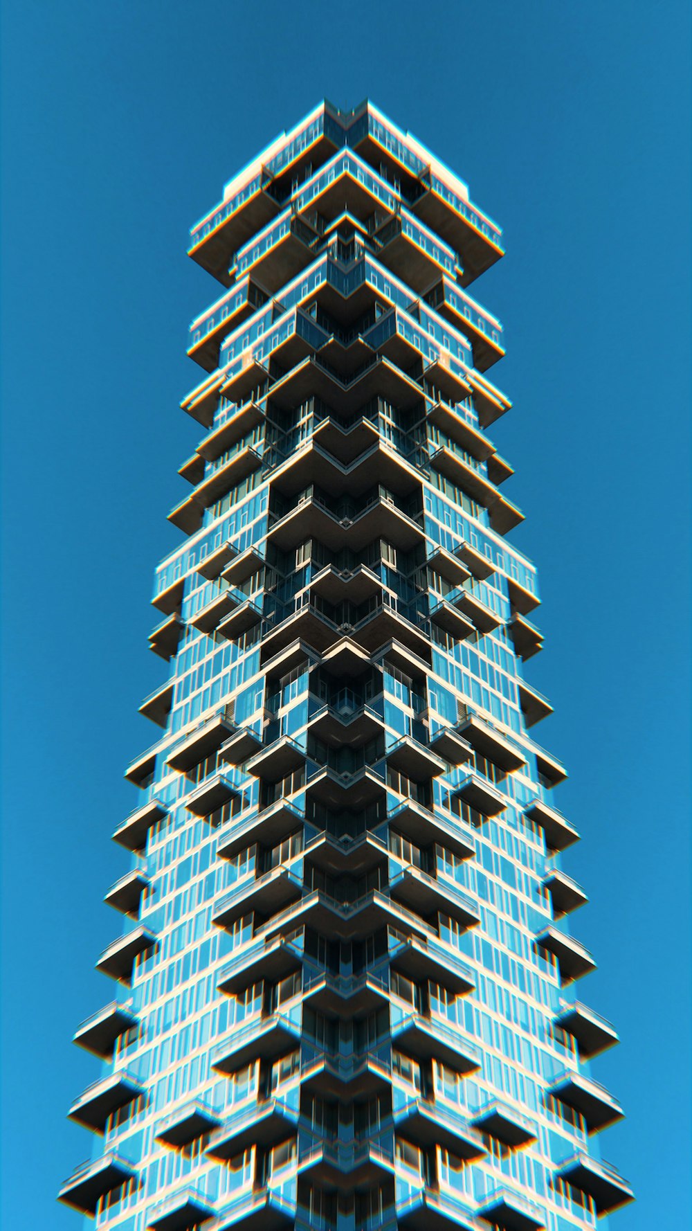 blue curtain-wall high-rise building