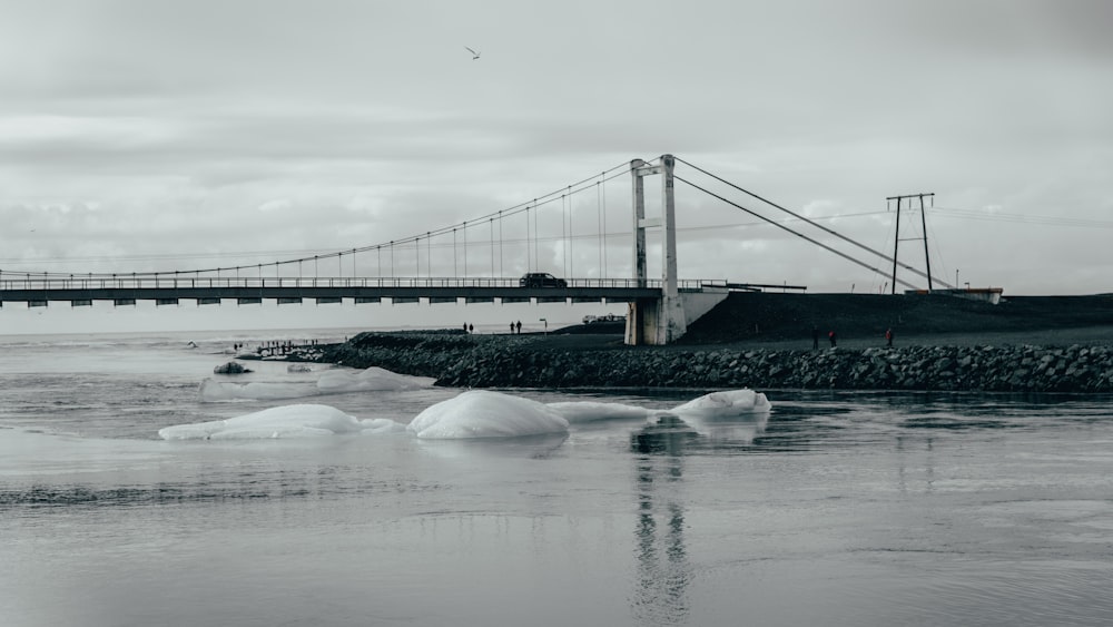 bridge under cloudy sky