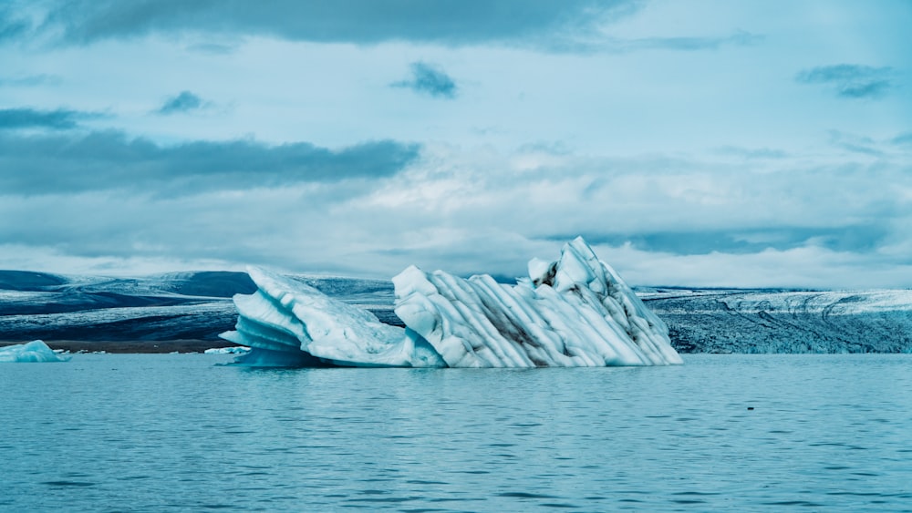 icebergs on body of water