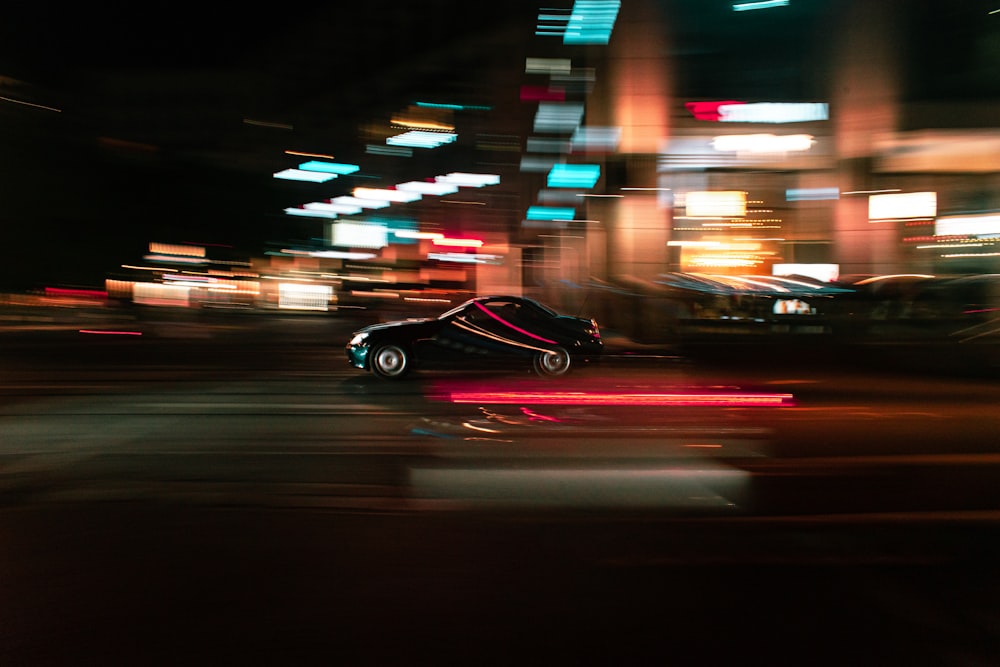 time lapse photography of vehicle running on road