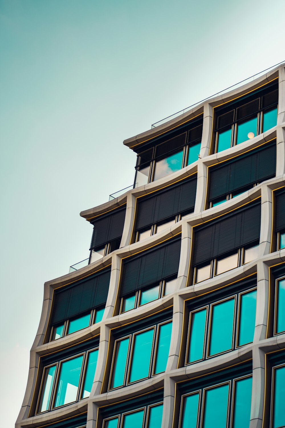 concrete building with mirror walls