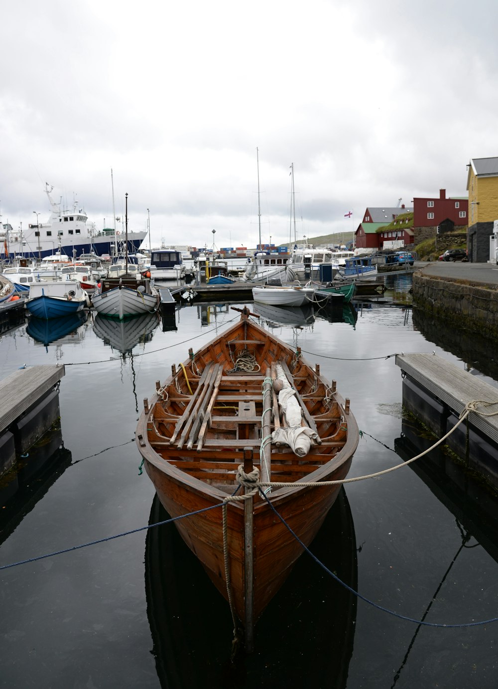 brown wooden canoe boat