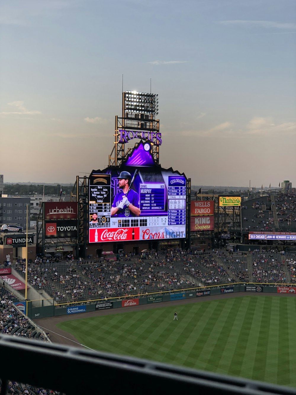 turned-on monitor in baseball stadium