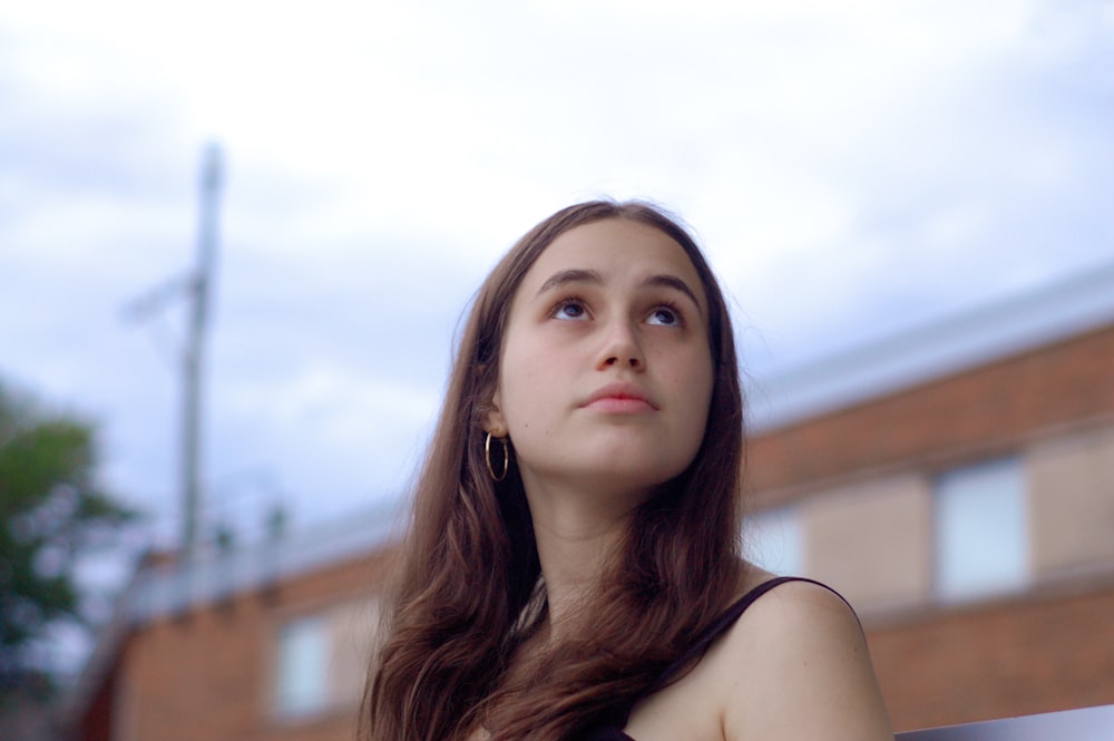 woman facing sideways outdoors