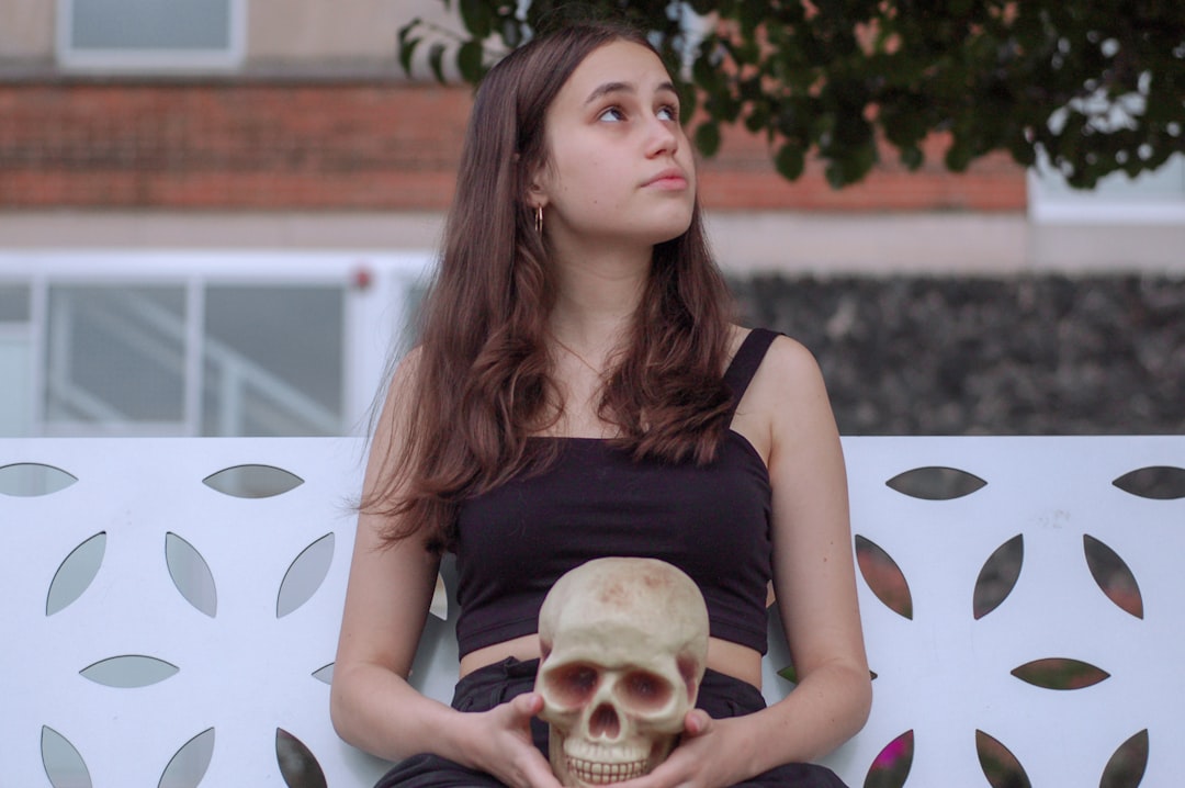 woman holding skull