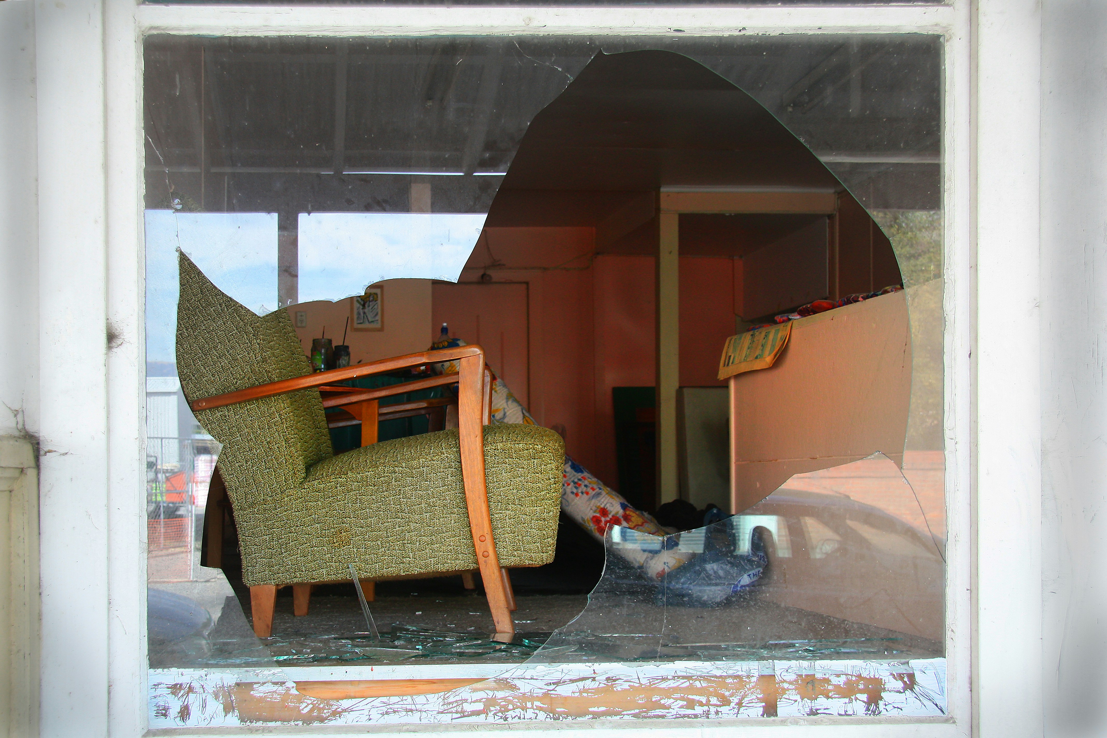 illustration of different types of property damage like a water-damaged ceiling and a dented car - property accident attorney