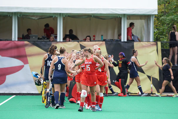 Players shaking hands before a friendly match in the tournament.