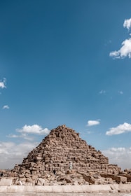 Ancient pyramids rising against a clear blue sky, inviting exploration.