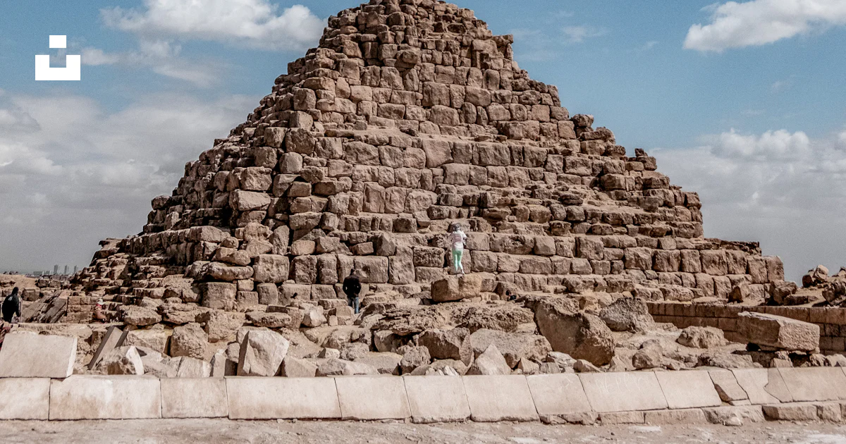 Brown bricks pyramid during daytime photo – Free Blue Image on Unsplash