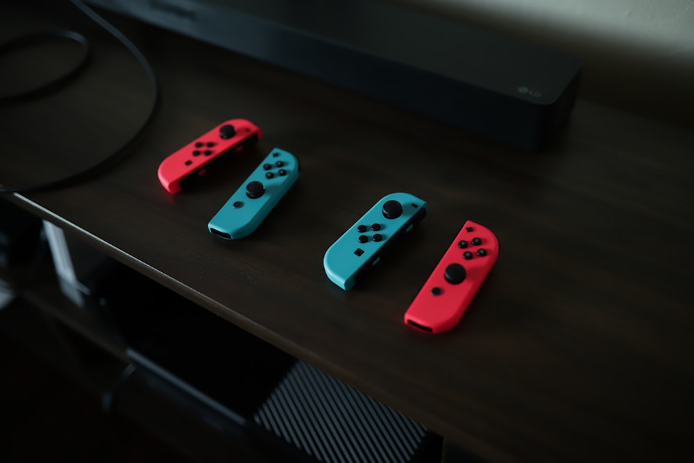 two pairs of Nintendo Switch controllers