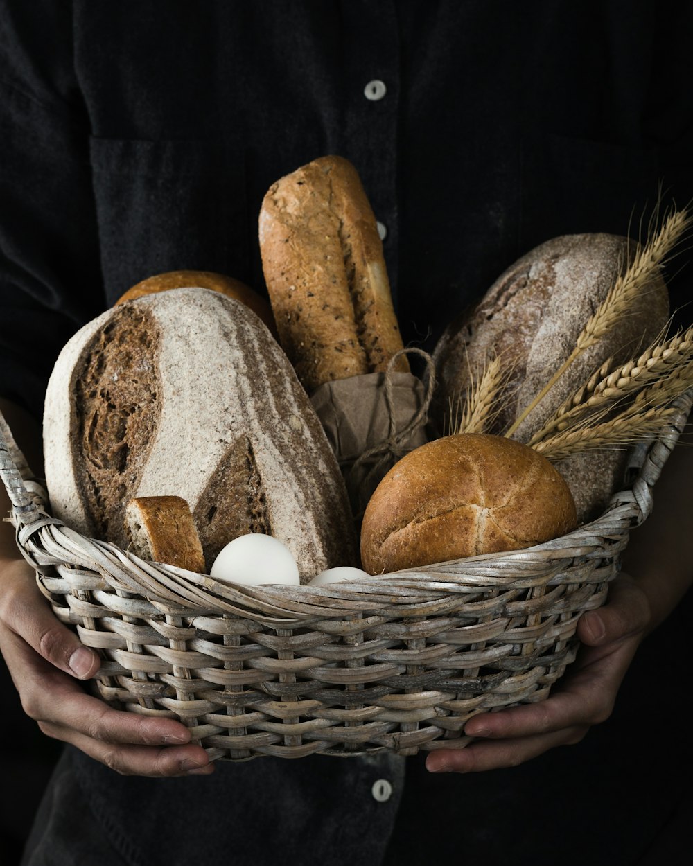 breads on wicker basket